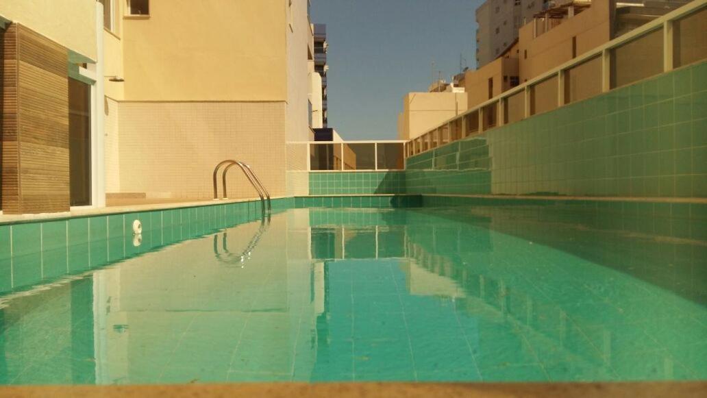 Praia do Morro: Beachfront Apartment with Pool and Wi-Fi Guarapari Exterior photo
